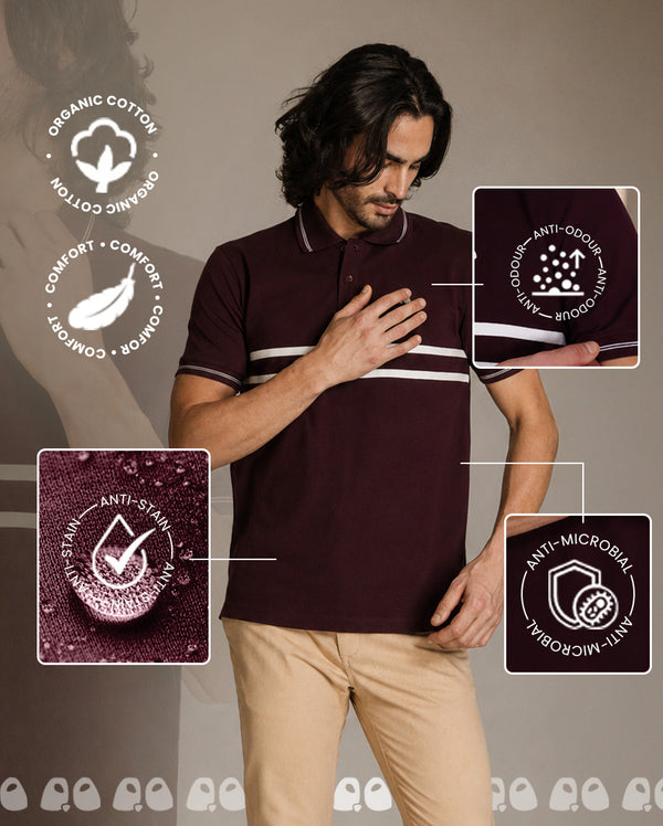 A man modeling a dark vandee maroon polo shirt with white stripes on the collar and sleeve cuffs