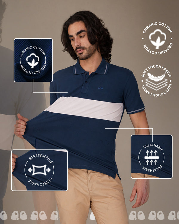 A man wearing a navy and white color-blocked short-sleeve polo shirt vandee